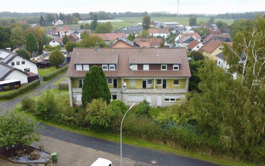 Vier Reihenhäuser mit Potenzial – Sanierungsbedürftiges Mehrfamilienobjekt!