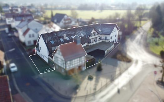 Attraktives Mehrfamilienhaus mit 8 Wohnungen + Werkstatt und Lagerhalle!
