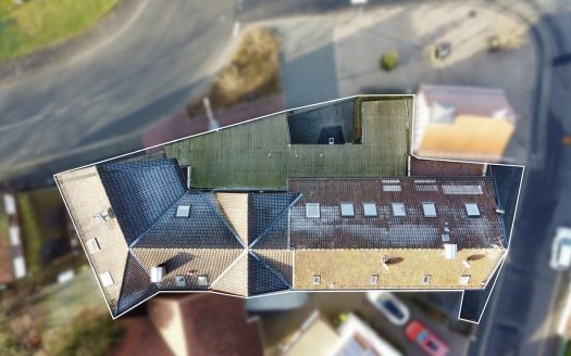 Attraktives Mehrfamilienhaus mit 8 Wohnungen + Werkstatt und Lagerhalle!